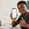 Nigerian student using an offline CBT practice app for UTME and WAEC preparation