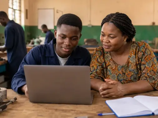Nigerian technical college student checking NABTEB Federal Technical College placement status on a laptop