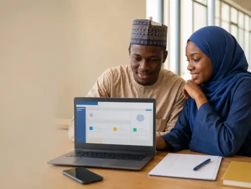 Nigerian university applicants completing an online admission screening registration on a laptop